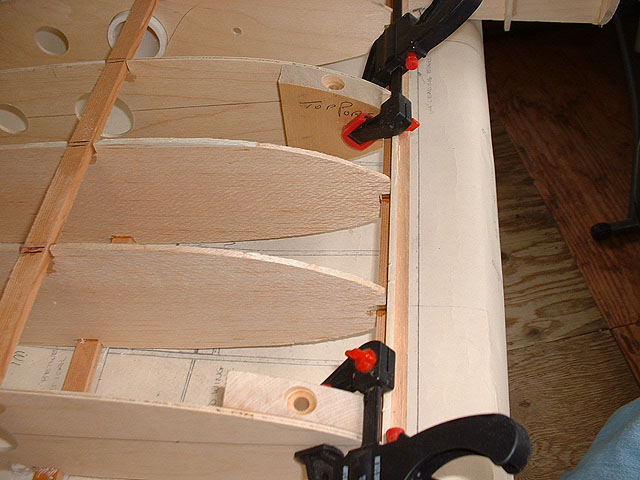 Front hardwood wing mounting blocks.