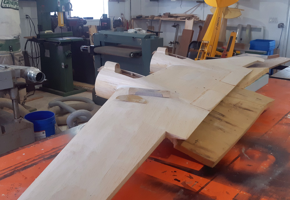 Sanding the wing bottom.