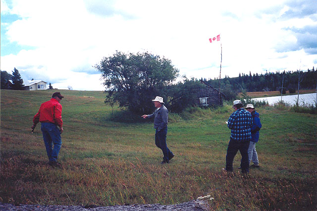 Eldon Lendon flying a kite at Bedore Lake.